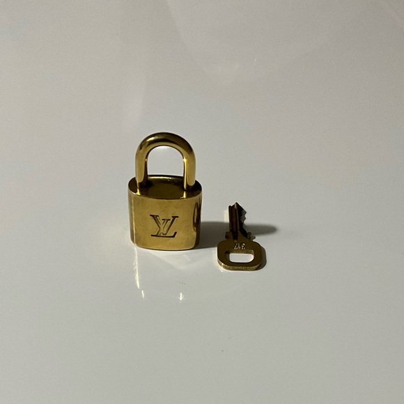 Louis Vuitton Lock & Key - Picture 1 of 4